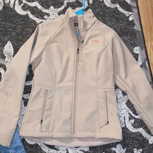 Women’s NorthFace jacket, size medium, brand new.